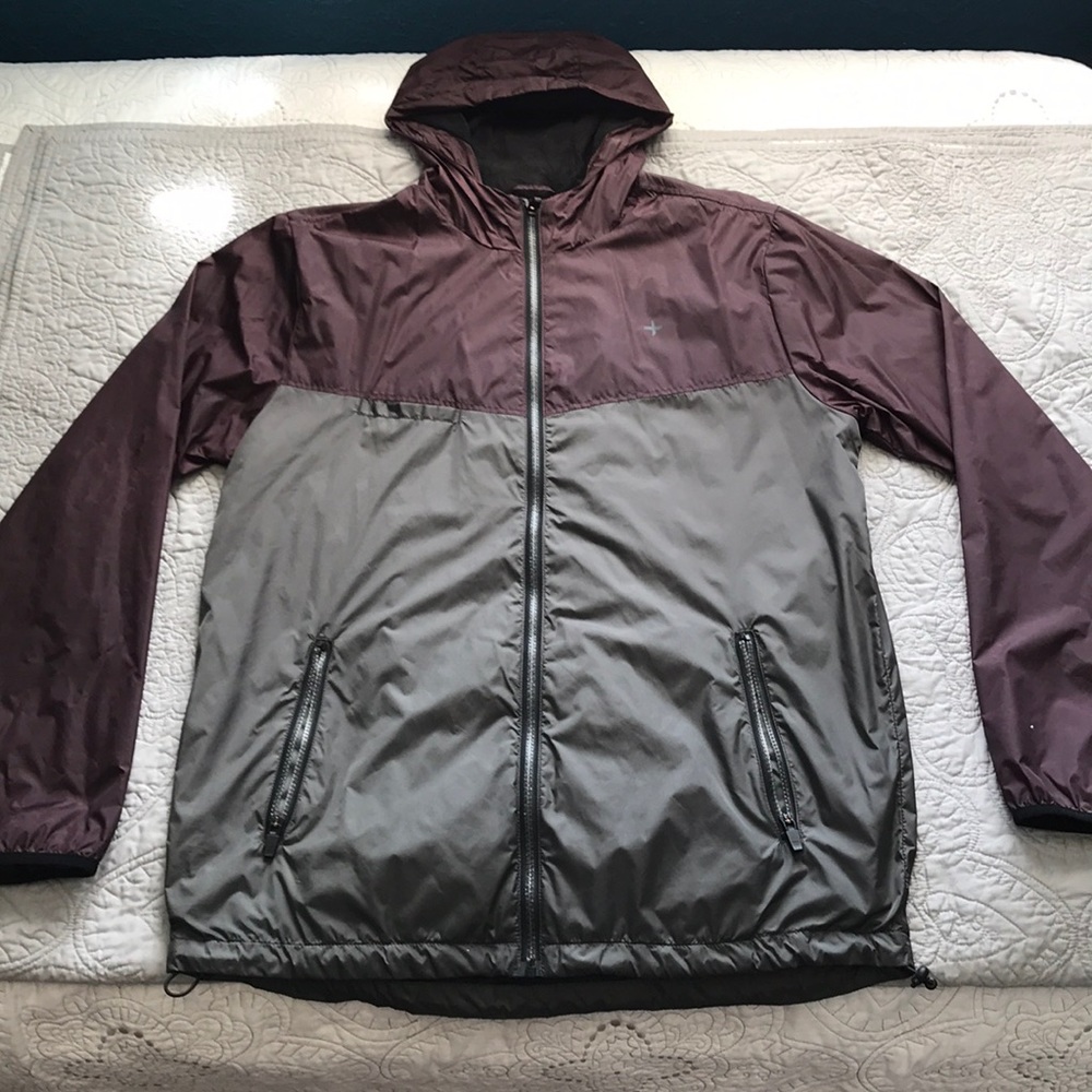 Burgundy and grey Tavik windbreaker.